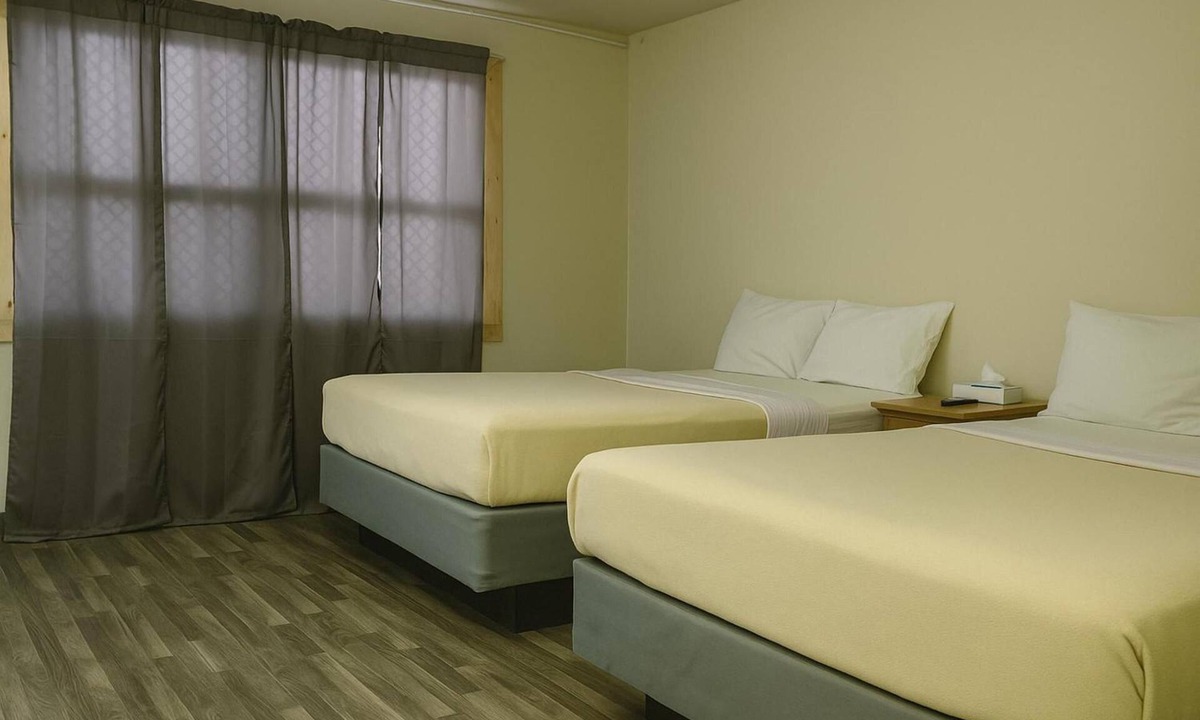 Wolf Point Hotel | 2 Value-Driven Rooms Near Local Dining Options, Next to Wolfe Pointe Museum