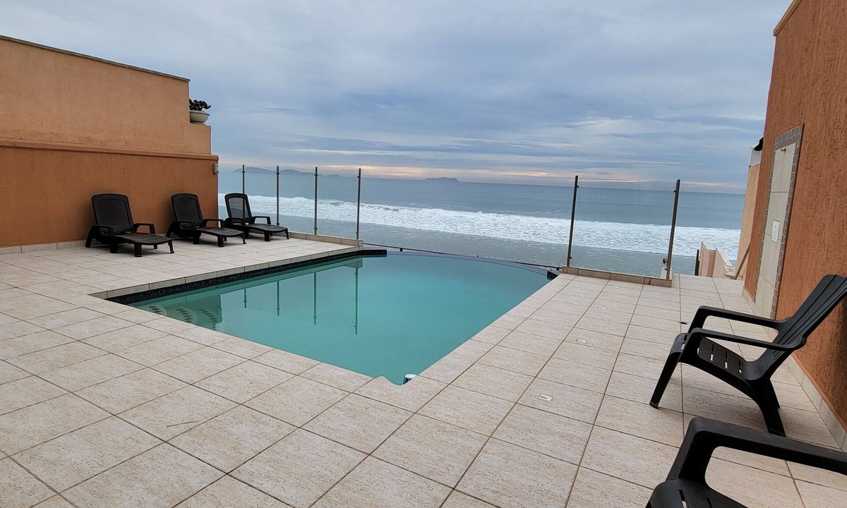 Triangulo de Oro Condo | Beach Front with Pool, Piano, Pool Table, Bar and Beach Access