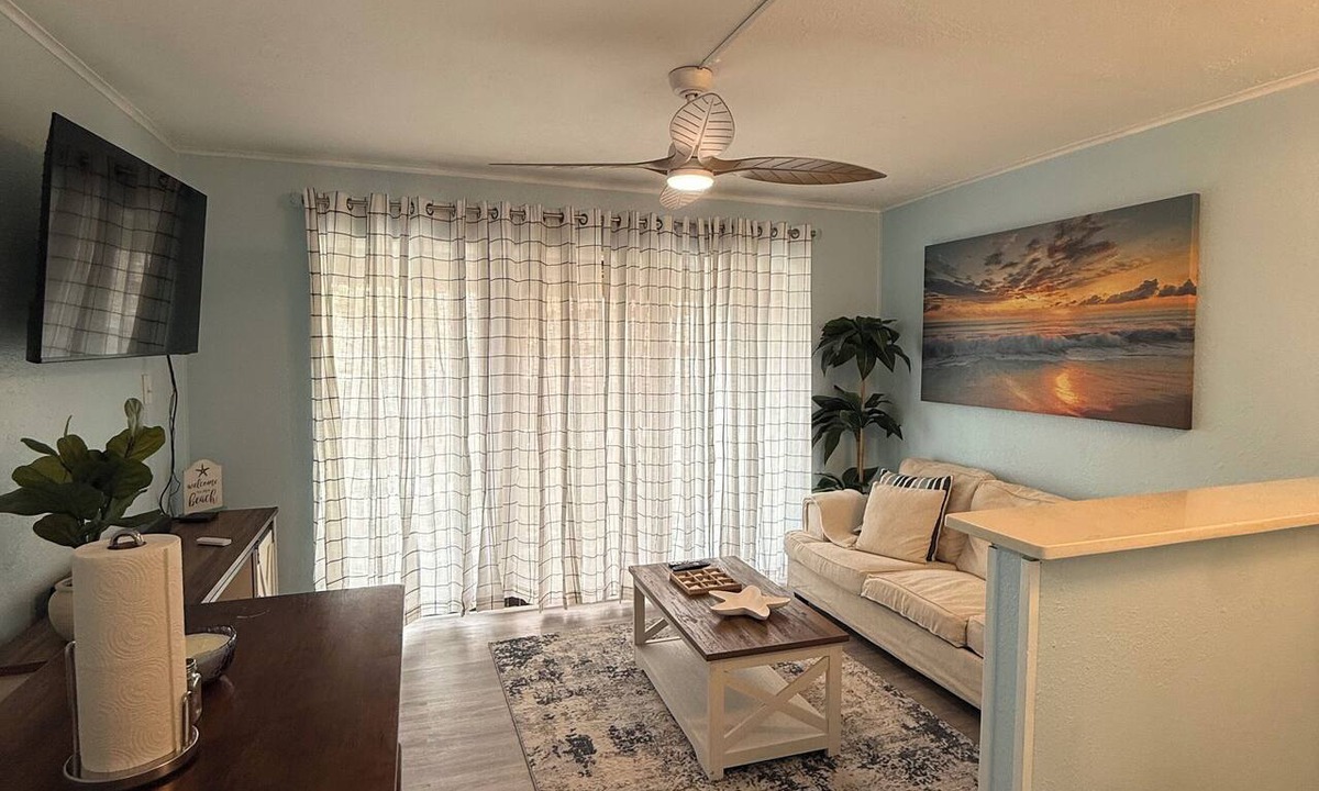North Beach Condo | Beachside escape at Villa Del Sol—steps away to sand, pool, Aquarium & USS Lex.