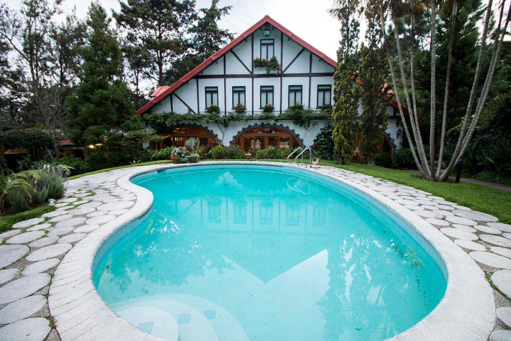 Zona 9 de Mixco Hotel | Cabaña Suiza