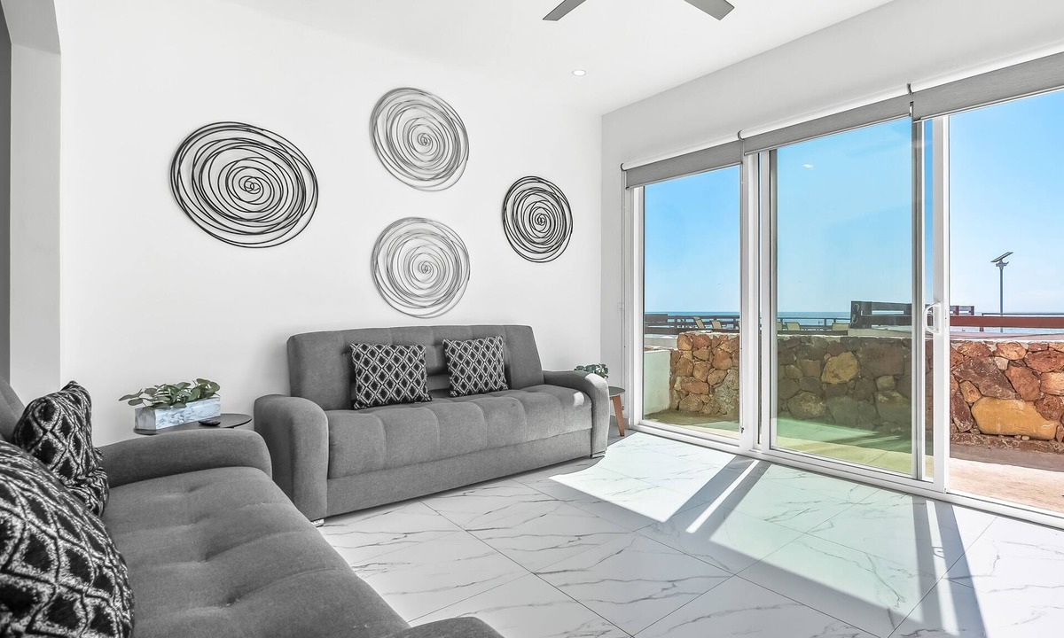 La Paloma House | Dog-friendly home with heated pool, hot tub, partial ocean views, & balcony