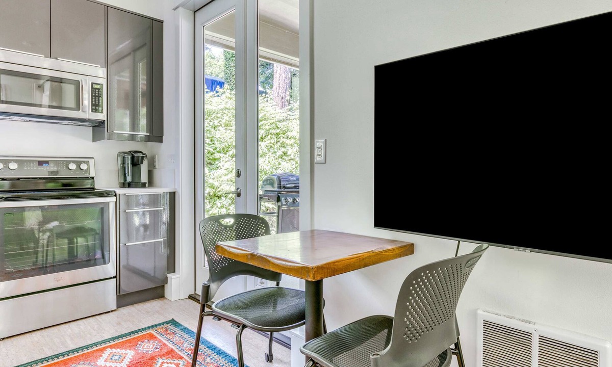 Stevenson House | Dog-friendly studio with river view, patio, grill, & shared W&D