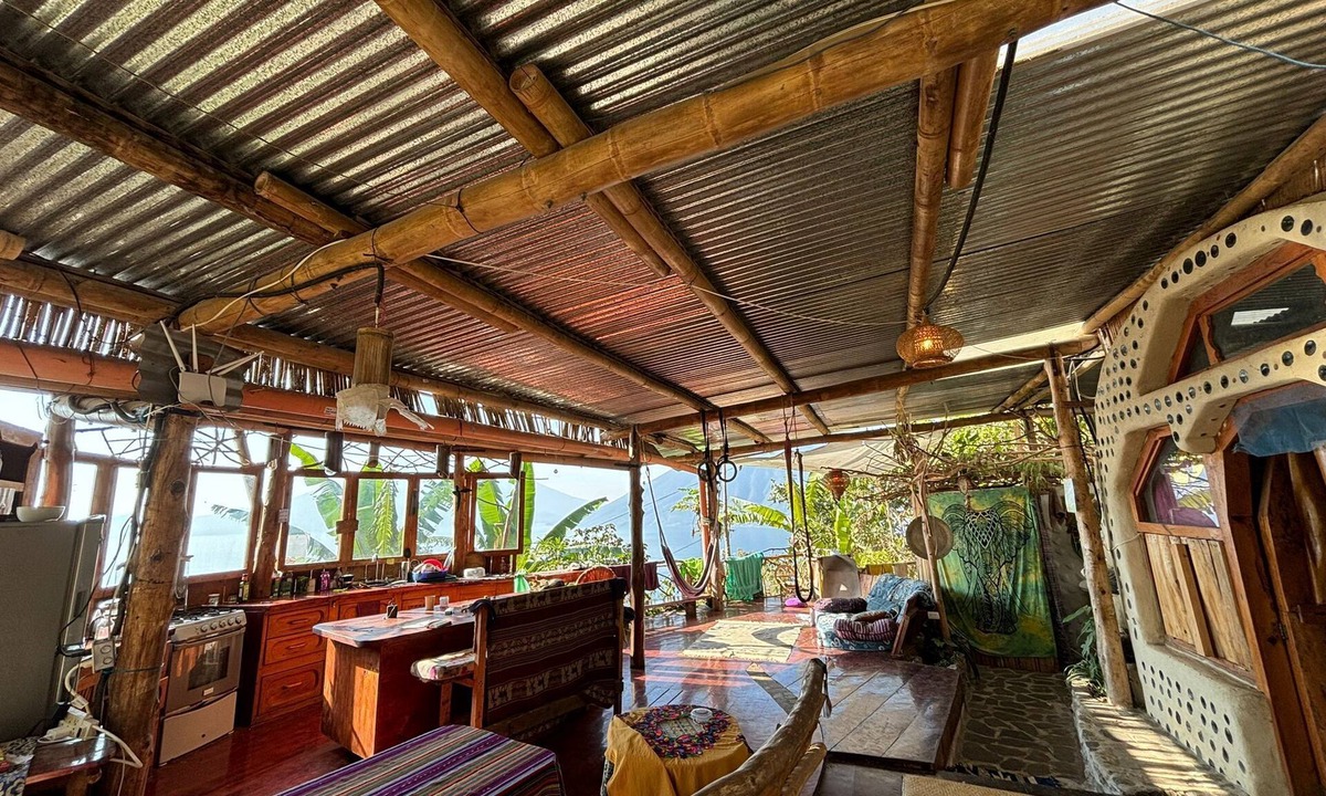 Pasajcap House | Earthship 3-level apt., portside, connected to an outdoor kitchen with a view.