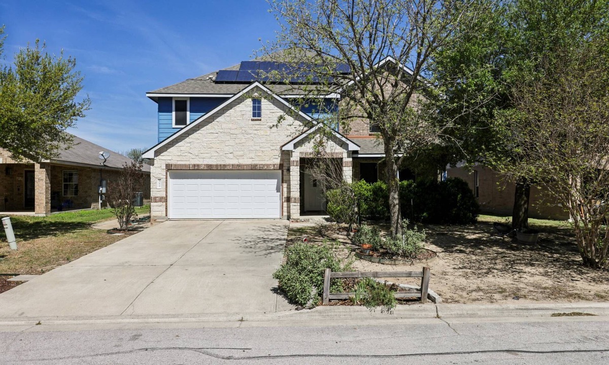 Hutto House | Huge Handicap Accessible Home Sleeps 21. Game Room, Office, Stocked Kitchen with so many TVs
