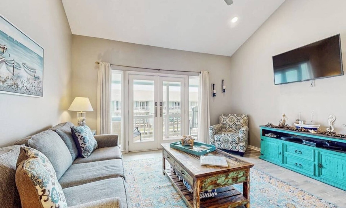 Key Allegro Condo | Inviting condo with private boat slip, pool, tennis, balcony, central AC, & W/D