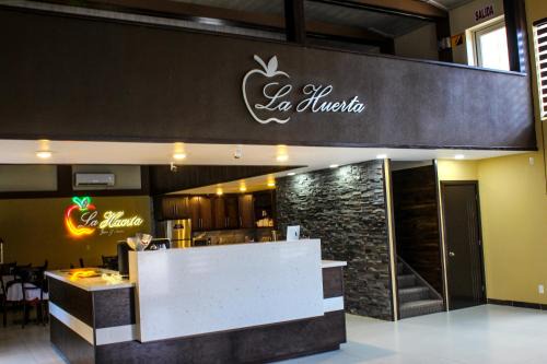 Cuauhtemoc Hotel | La Huerta Inn & Suites