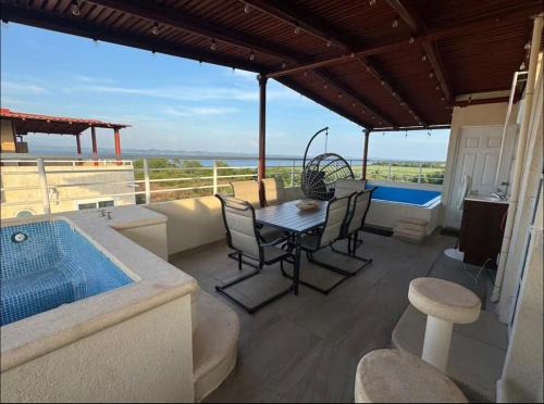 Puente del Mar Apartment | Marina Diamante Departamento con roof