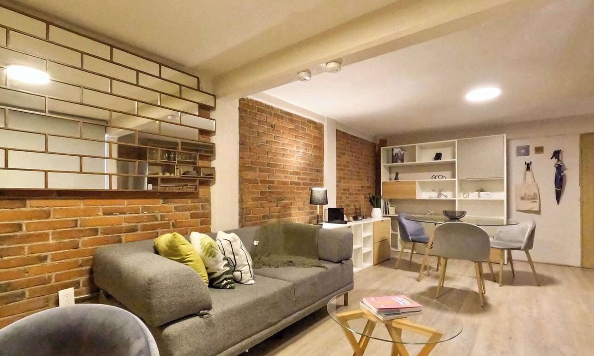 Del Carmen Apartment | Modern brick retreat in Coyoacán | Patio