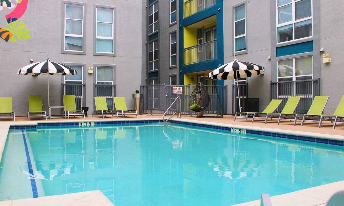 West Campus Apartment | Modern Condo With Pool, Gym, Workspaces & BBQ