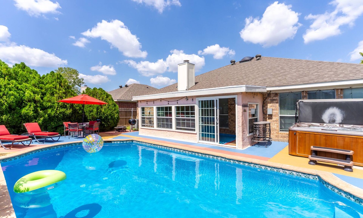 Crowley House | Private Heated Pool, Big Hot Tub, Fenced Yard, Fire Pit, 6 TVs, & Stone Floors