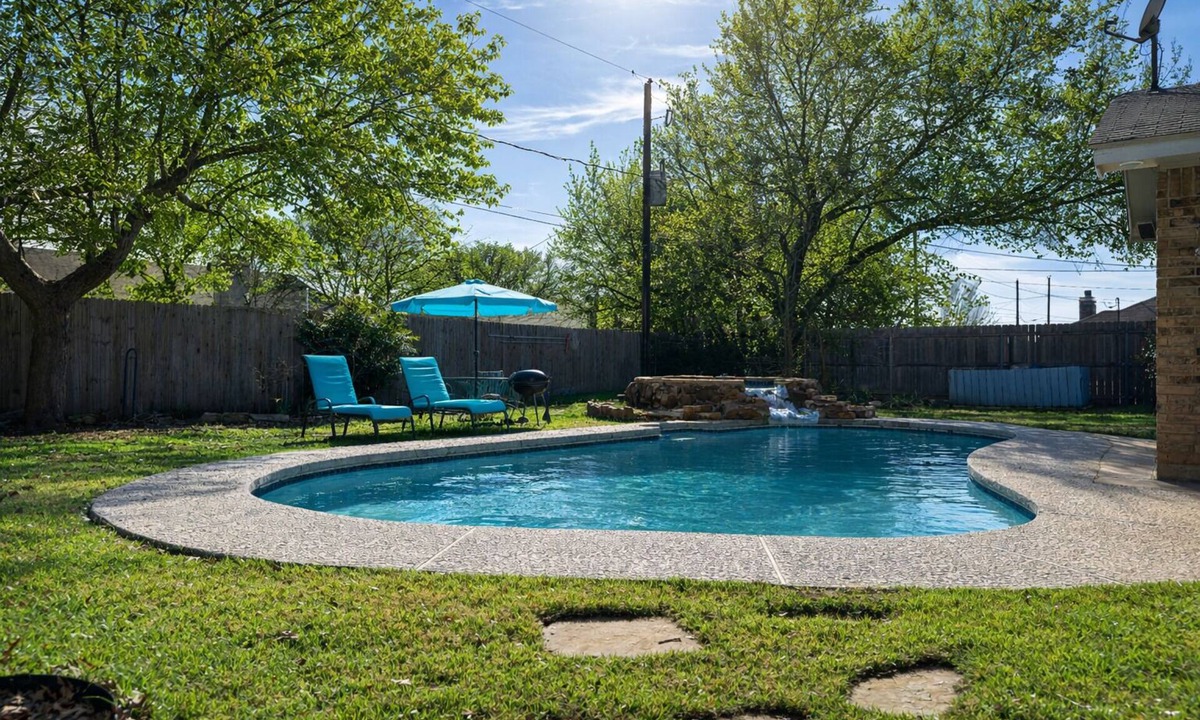 Crowley House | Private Hot Tub & Heatable Pool, Large Fenced Yard, Office, & Pet Friendly
