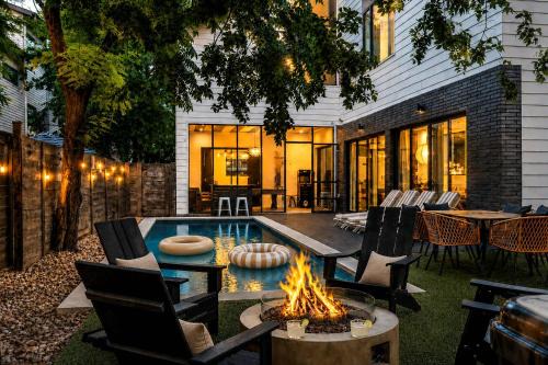 East Cesar Chavez House | Refined Rainey Retreat - Pool - Hot tub - Fire Pit