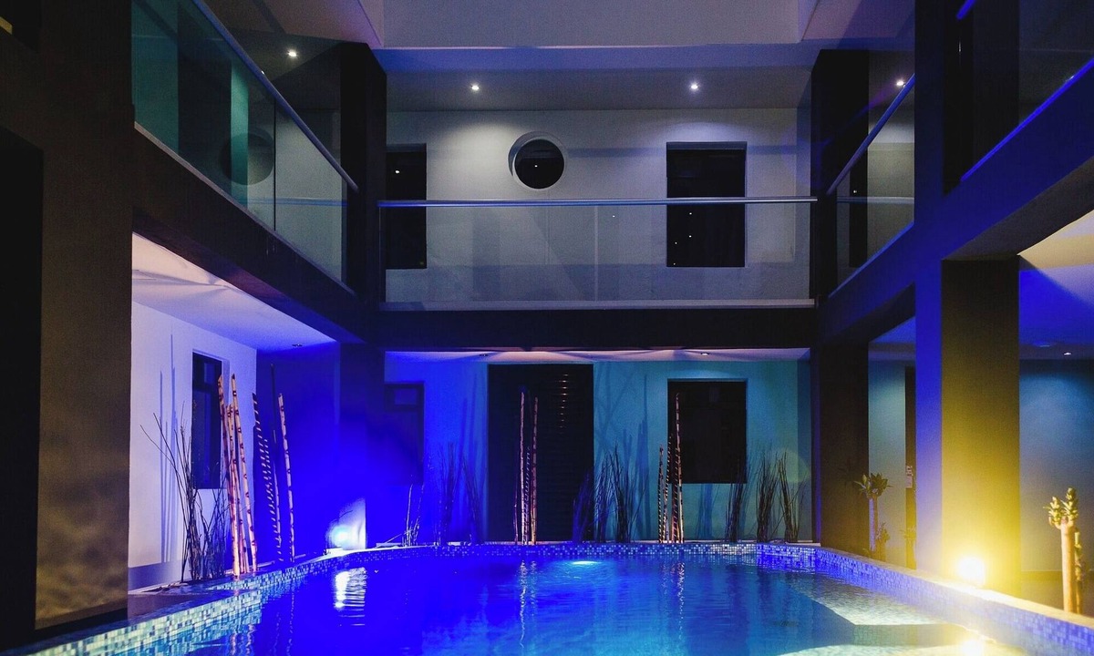 Centro Hotel | Relax in Two Bright Fun Rooms Close to Culture, Food, and Fun Spots