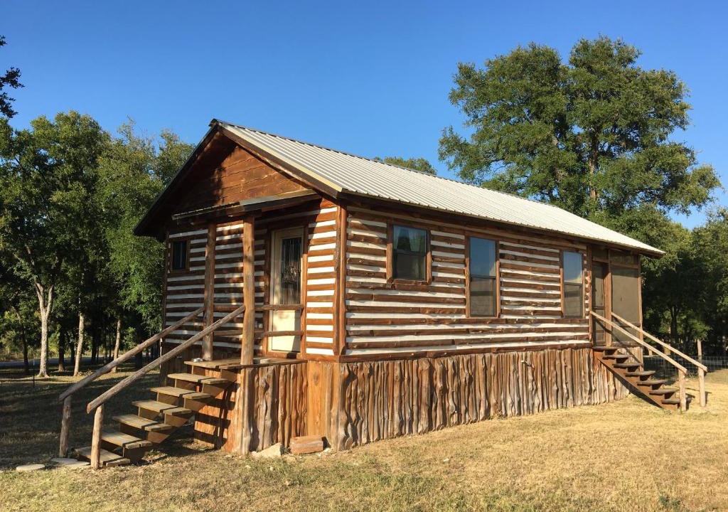 Prairie Lea House | Son's Blue River Camp LogCabin1 - Beautifully done cabin on the San Marcos River!