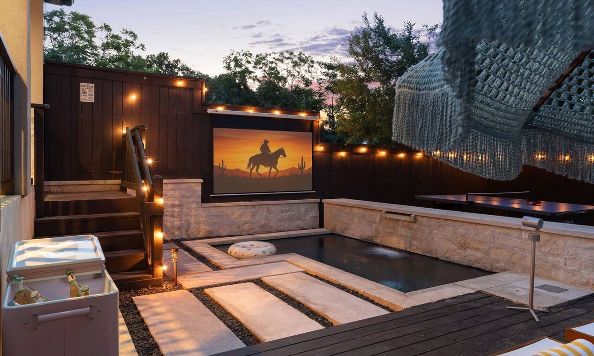 Riverside Condo | Sunset Saloon - Pool, Outdoor Theater & Ping Pong