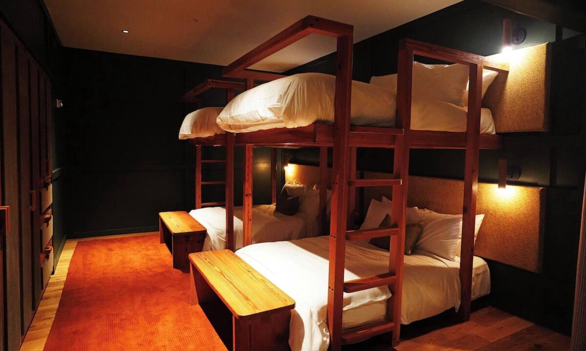 Fredericksburg Hotel | The Albert | Bunk Room | 4 Queen Beds, Pool & Lounge Area