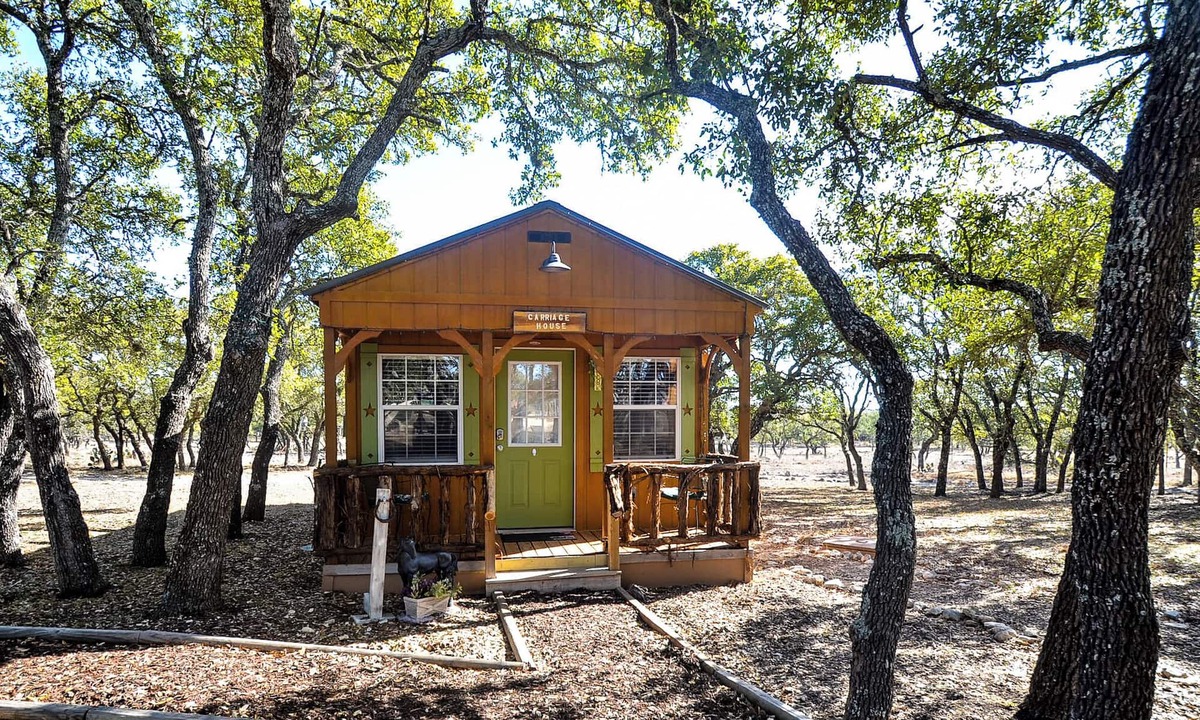 Mountain Home Cabin | The Carriage House Cabin- Texas Hill Country Western-themed cabin for 4 in the woods near Kerrville & Fredericksburg