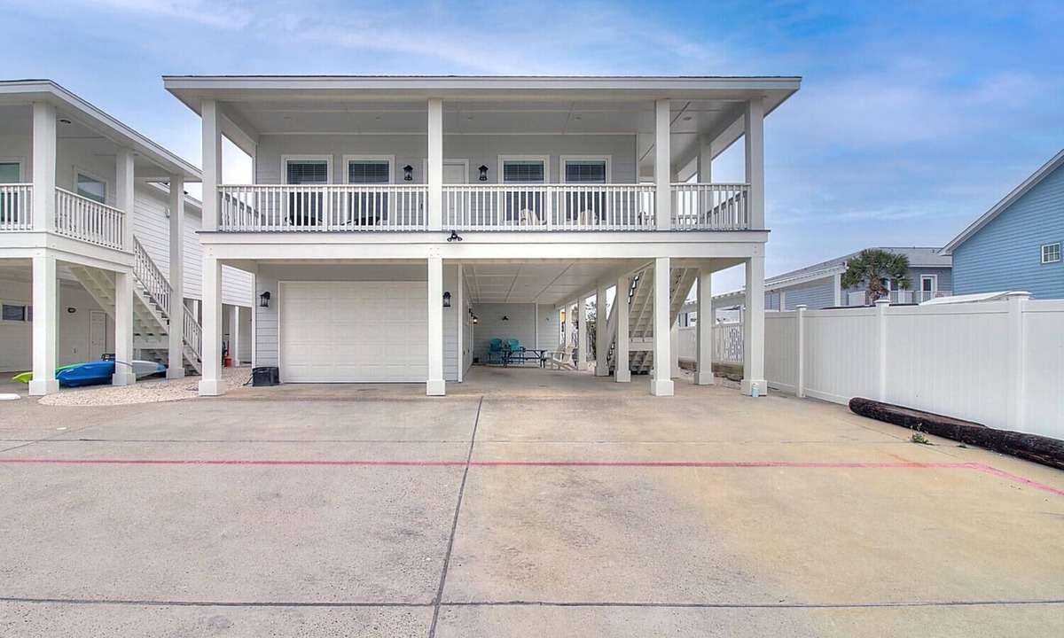 Port Aransas House | This charming beach bungalow is located right next to the community pool and clo