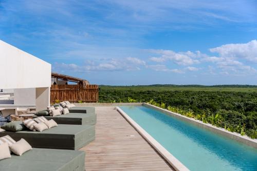 Playa Paraiso House | Tropical 2 Bedroom | Private Balcony & Rooftop | Casago