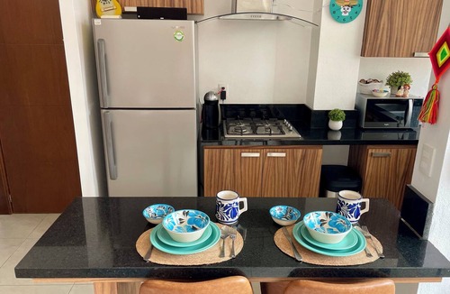 Diaz Ordaz Condo | 1 BR w KING Bed Rooftop Pool Walk to BEACH Prime Location