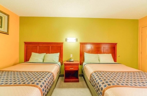 Denver City Hotel | 2-Room Budget Stay w/2 Full Beds & Tub for Relaxation