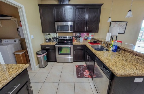 McAllen House | 4BR Smart Luxe Condo w/Pool View, Gated Community: close to Costco & Top Golf