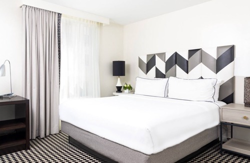 Norma Triangle Hotel | A Sophisticated Suite! Four Units with Furnished Living, Rooftop Pool, Balcony!
