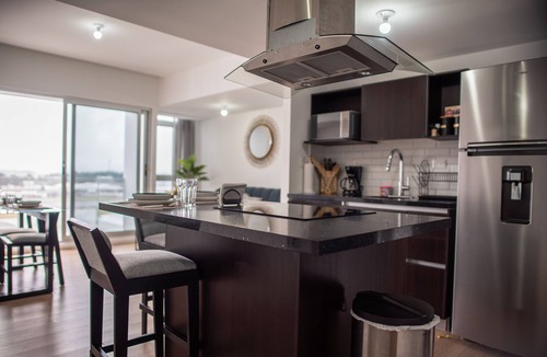 Zona 13 Apartment | Airport view, luxury and central location.