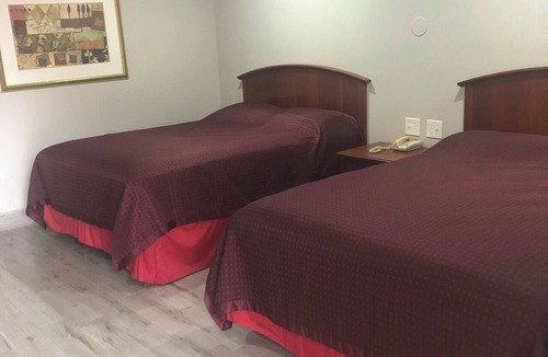 McKinney Hotel | American Inn