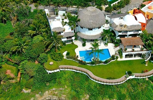 Santa Maria Huatulco House | An exclusive beach house, perched on a cliff with panoramic ocean views.