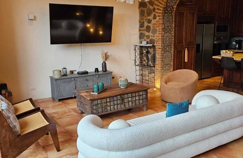 Ciudad Vieja House | Antigua Luxury Stay with Jacuzzi. Roof top fire pit and those volcano views!