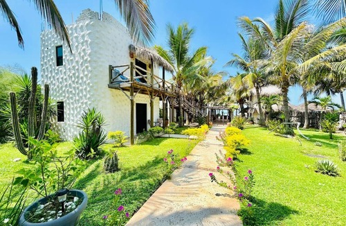 Elota Apartment | Beachfront Space with Pool By PartnerHost