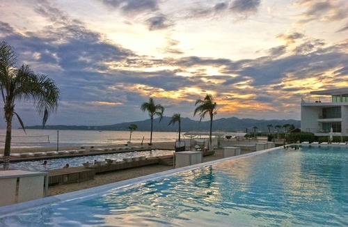 Flamingos Apartment | Beach-front spectacular view, sandy beach & beautiful oversize pools
