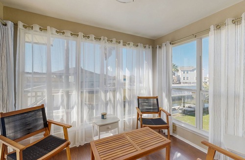 La Marque House | Beach house with private ping-pong and foosball table, patio and water view