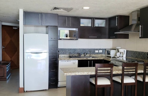 South Hotel Zone Condo | Beachfront 1 br. condo with private hot tub at Gran Venetian Puerto Vallarta