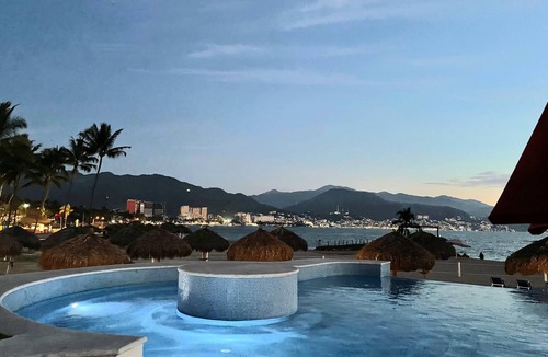 South Hotel Zone Condo | Beachfront 1 br. condo with private hot tub at Gran Venetian Puerto Vallarta