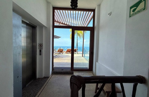 South Shore Hotel Area House | Beachfront steps from Romantic Zone: Casa Cuatro Abrazos (Entire House)