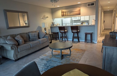 Walden on Lake Conroe Apartment | Beautiful sunrises waterfront condo with boat docking on backyard