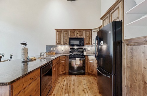 Big Sky House | Beautifully updated Big Sky chalet with hot tub, deck & free WiFi