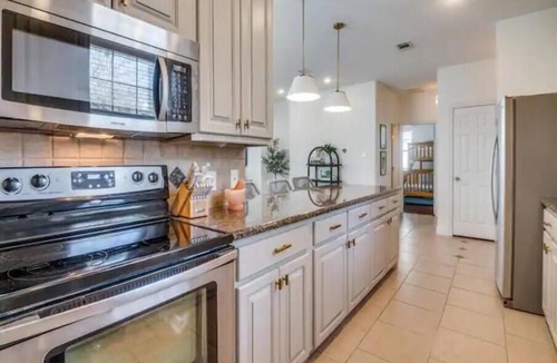 Enchanted Oaks House | Bright lakeside bliss. Your vibrant retreat awaits!