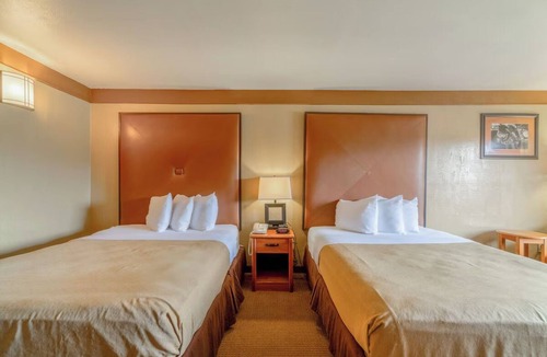 Beeville Hotel | Budget-Friendly Stay w/Two Queen Beds & Dining Space in Beeville