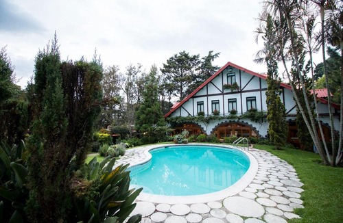 Zona 9 de Mixco Hotel | Cabaña Suiza