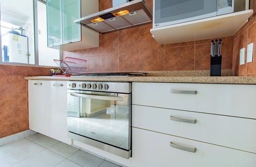 El Yaqui Condo | Capitalia | Bright & Cozy Family Apt in Santa Fe