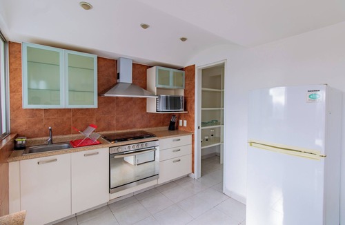 El Yaqui Condo | Capitalia | Bright & Cozy Family Apt in Santa Fe