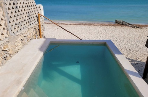 Chuburna Puerto Cottage | Cascada suite. Private Waterfall Pool & Cinema Screen I Beachfront Sanctuary