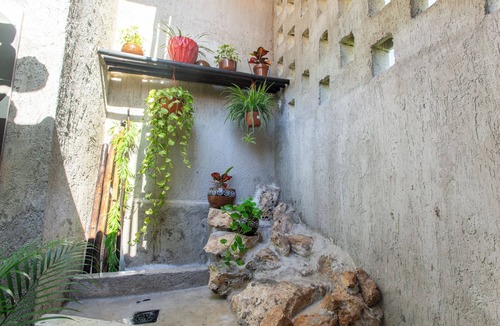 Chuburna Puerto Cottage | Cascada suite. Private Waterfall Pool & Cinema Screen I Beachfront Sanctuary