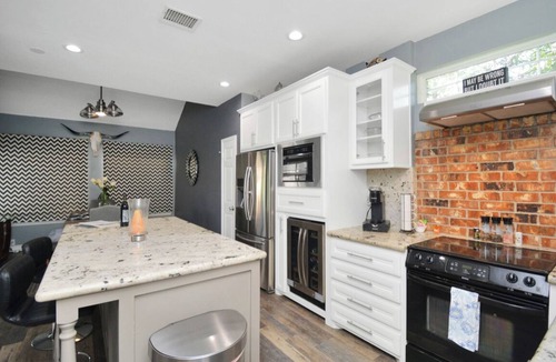Barker House | Charming 3-bedroom patio house in peaceful Champions near Golf Course.