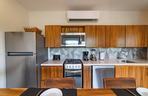 P Chahue Condo | Chic Central Living: 1BDR Condo in Prime Location