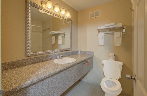 Duncanville Hotel | Clean and Simple Room with King Bed Perfect for Exploring Downtown Dallas
