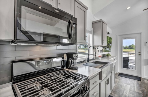 Brenham Cottage | Cottage with Bunk Beds - Includes 1 queen bed in the master, 2 bunk beds and 1 queen bed in the loft. A fully equipped kitchen, dining area, private bath and shower, TVs, Wifi, all utilities, access to all resort amenities. This cottage is pet friend